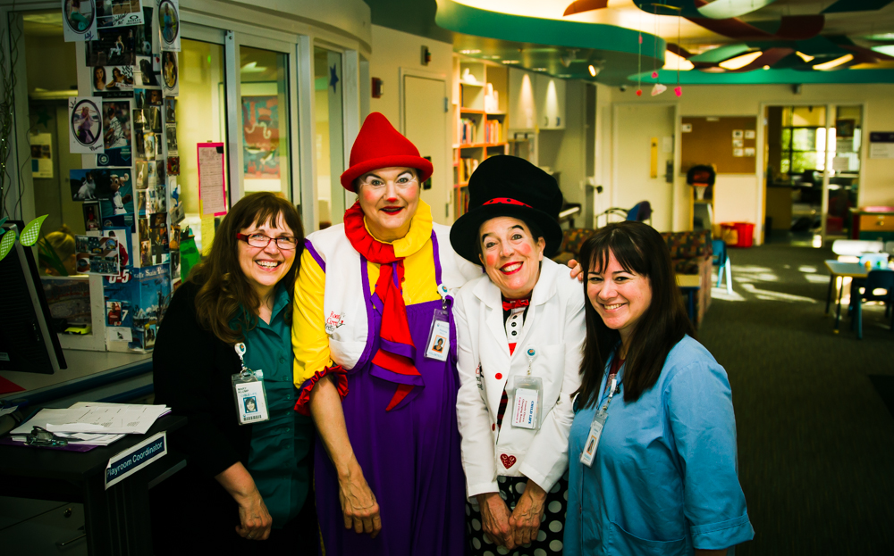 Victoria Millard as Dr. La Fou with another clown and two nurses